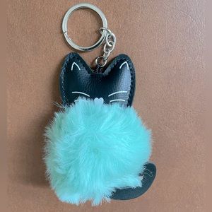 Kitty Cat Pom Pom NWOT Adorable fluffy bag charm key chain. Aqua blue pom
